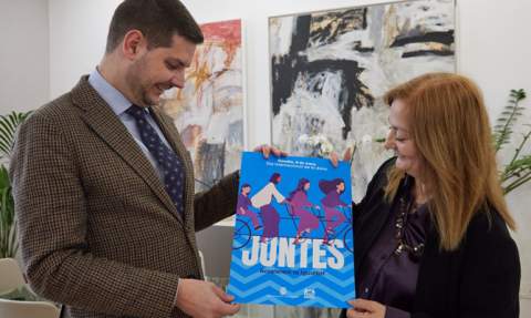 Prieto y Codina con el cartel de la programaci&oacute;n.