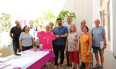 Asistentes a la reuni&oacute;n preparatoria de la carrera.